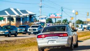 A state trooper cruiser parked facing other drivers