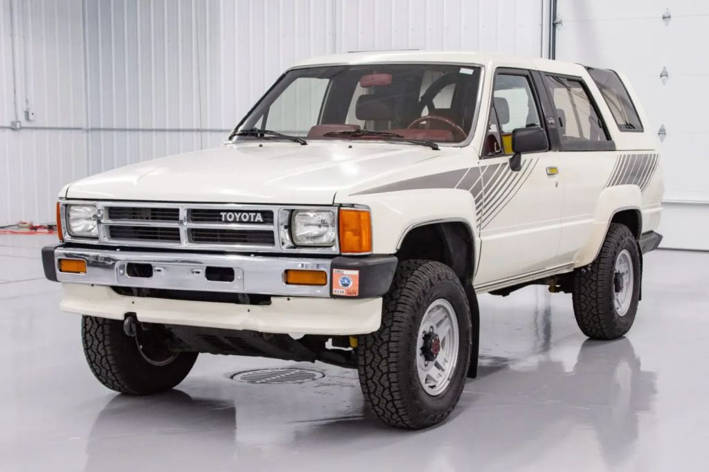 A white 1987 Toyota 4Runner parked in left front angle view