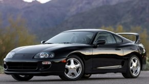 A black 1997 Toyota Supra Turbo parked in left front angle view