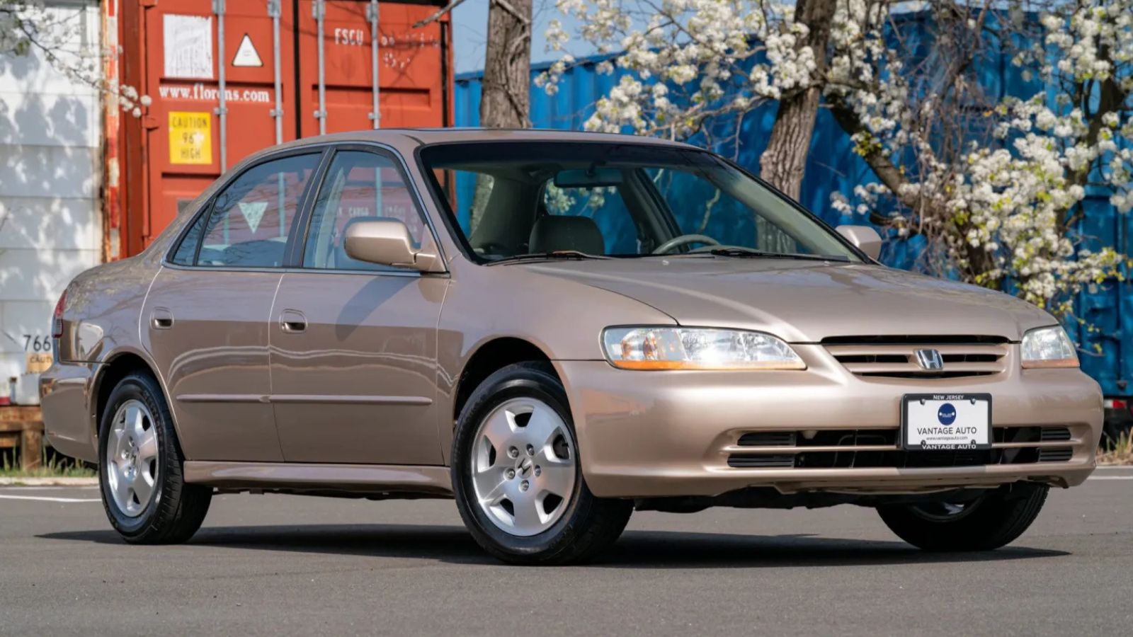 A champagne-colored 2002 Honda Accord EX parked in right front angle view