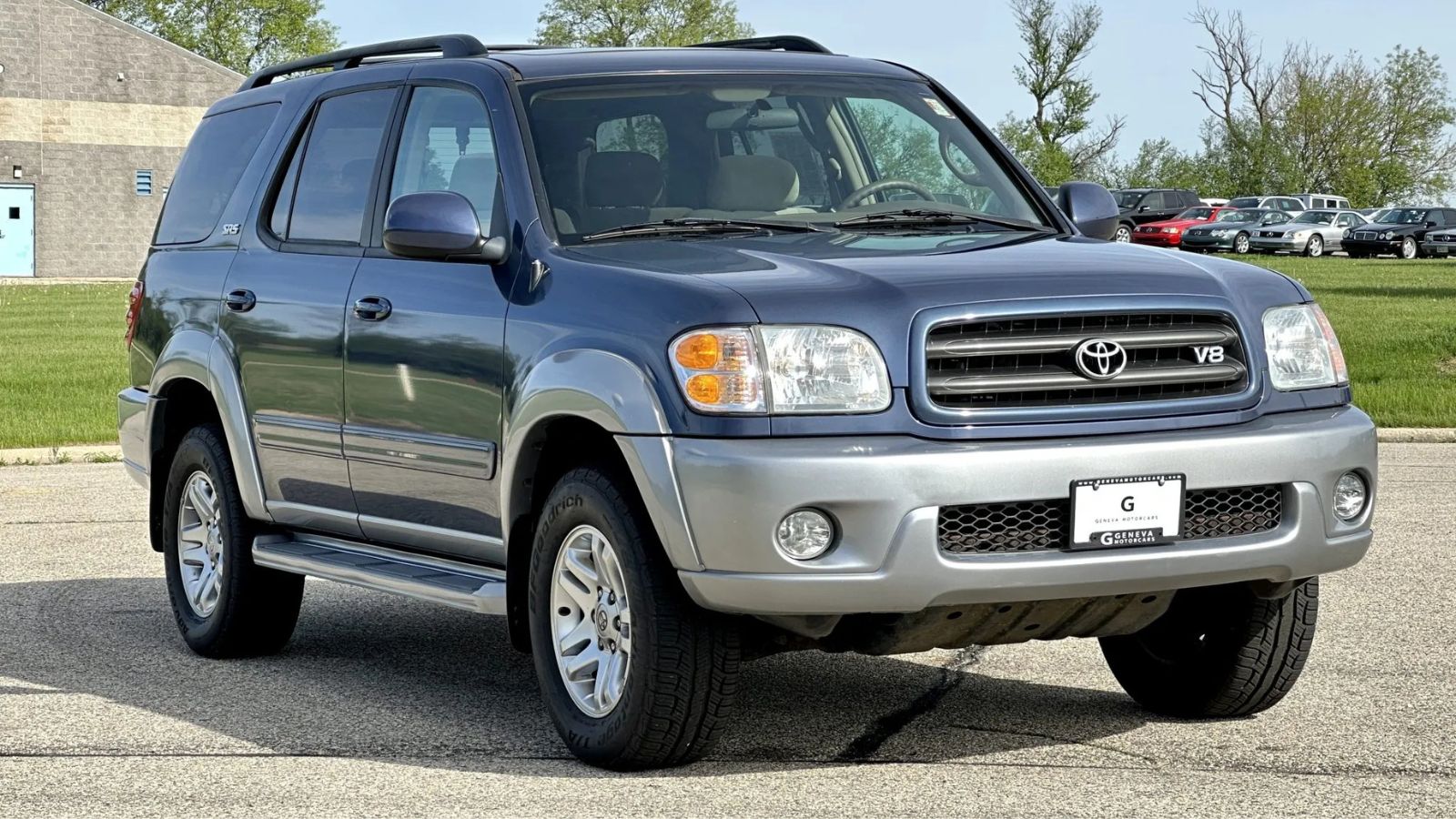 A blue-grey 2003 Toyota Sequoia SR5 4×4 parked in right front angle view