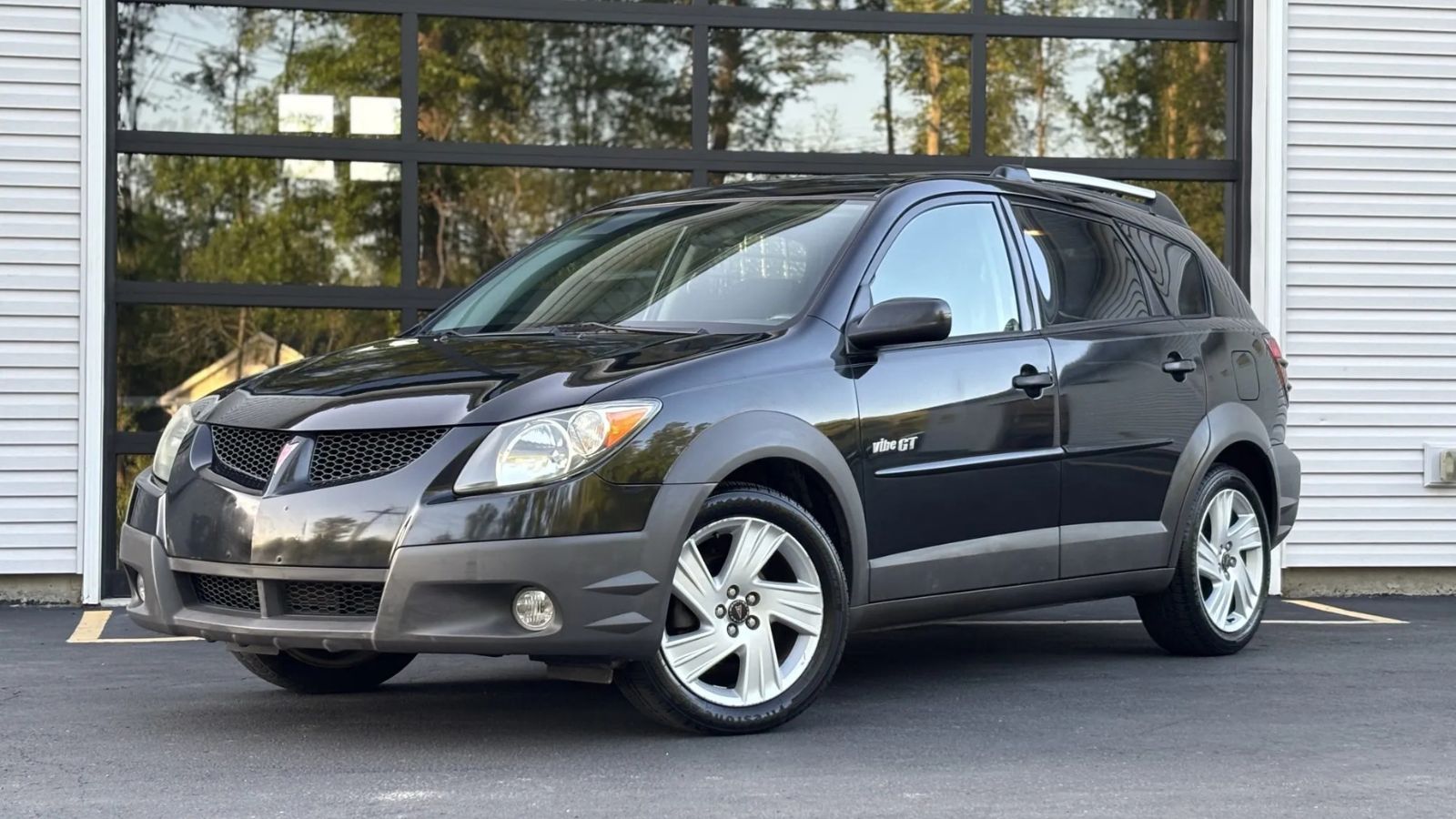 A black 2003 Pontiac Vibe parked in left front angle view