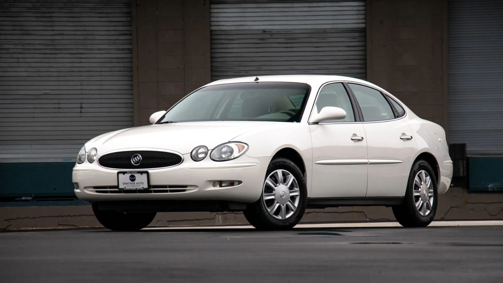 A white 2005 Buick Lacrosse sedan parked in left front angle view