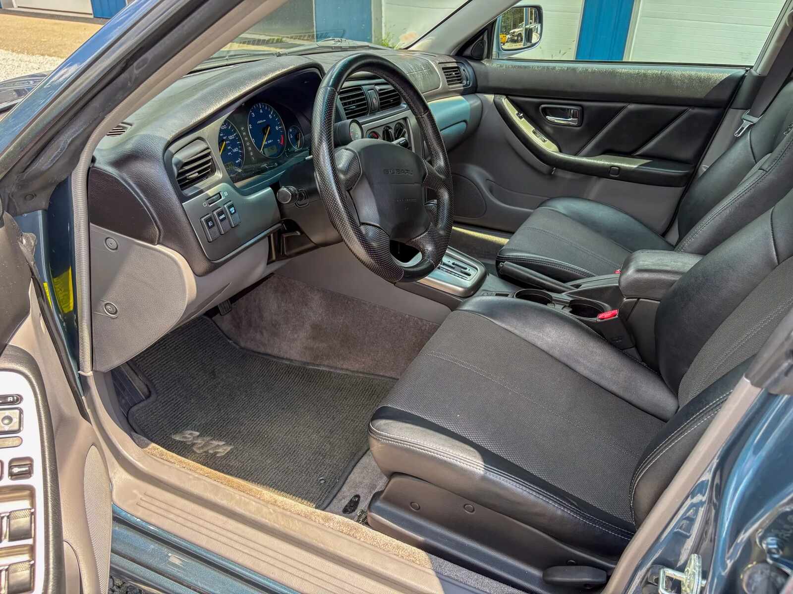 Left front interior view of a 2006 Subaru Baja Turbo