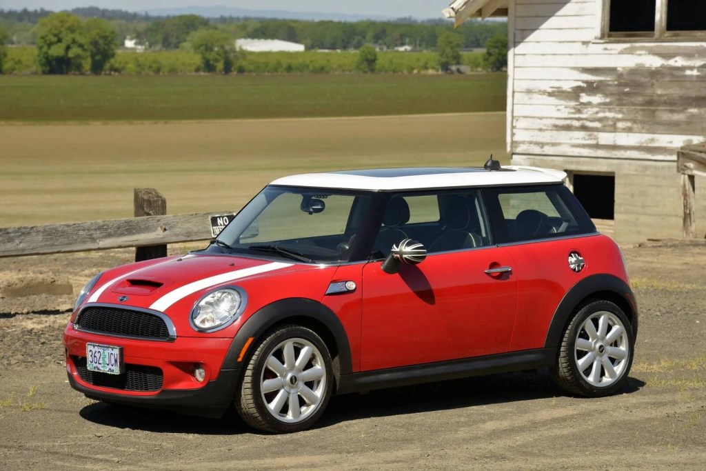 A red 2008 Mini Cooper S parked in left front angle view