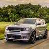 A grey 2020 Dodge Durango SRT driving in left front angle view