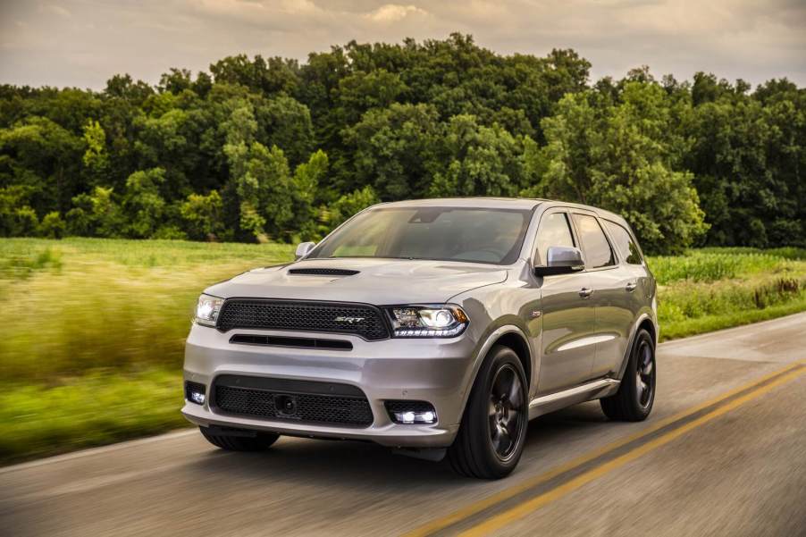 A grey 2020 Dodge Durango SRT driving in left front angle view