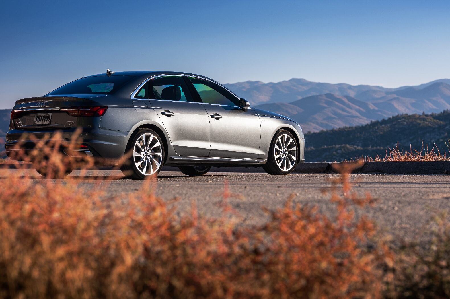 A silver 2021 Audi A4 sedan parked in far right rear angle view