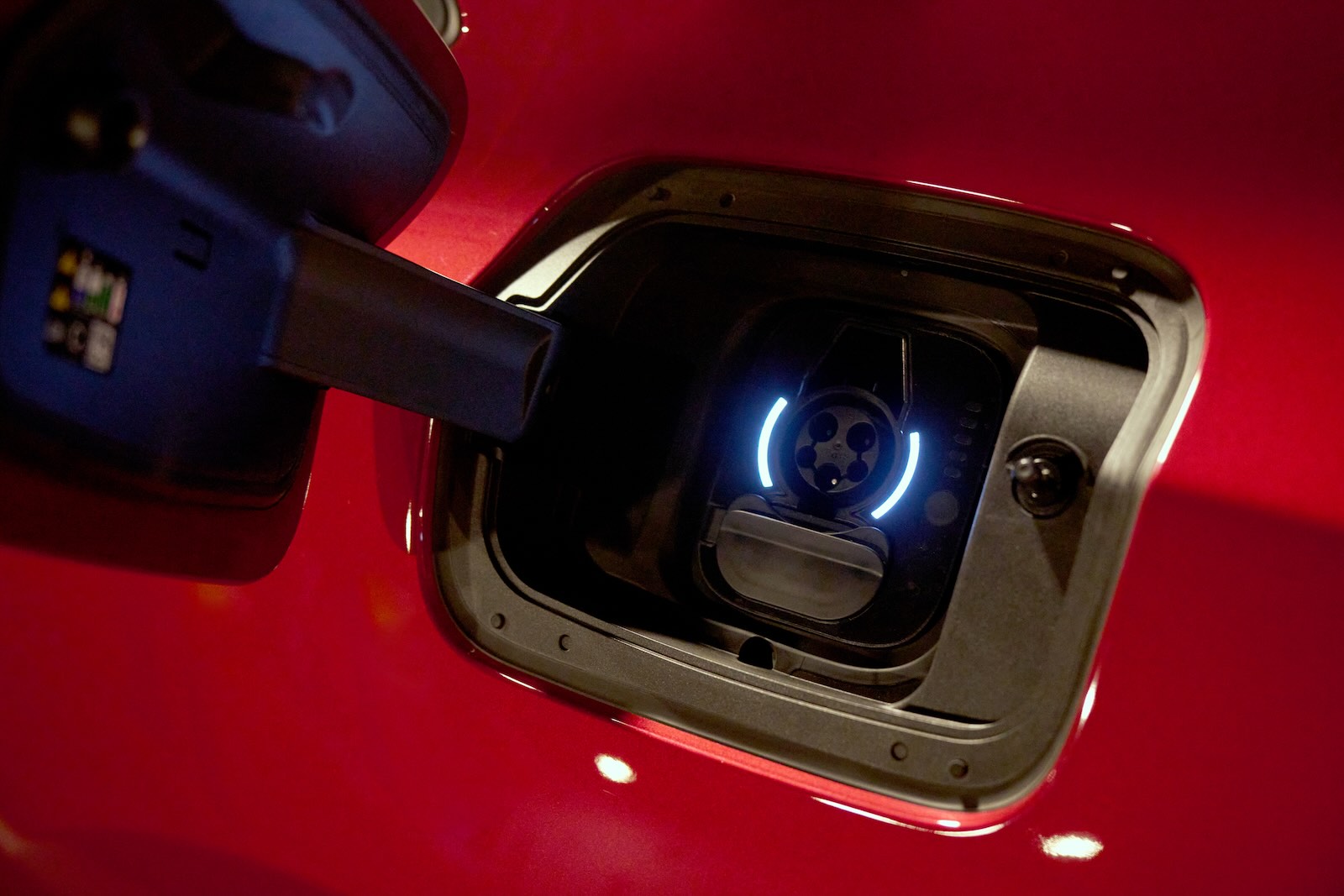 Closeup of the charging port on a 2025 Dodge Charger Daytona EV electric muscle car