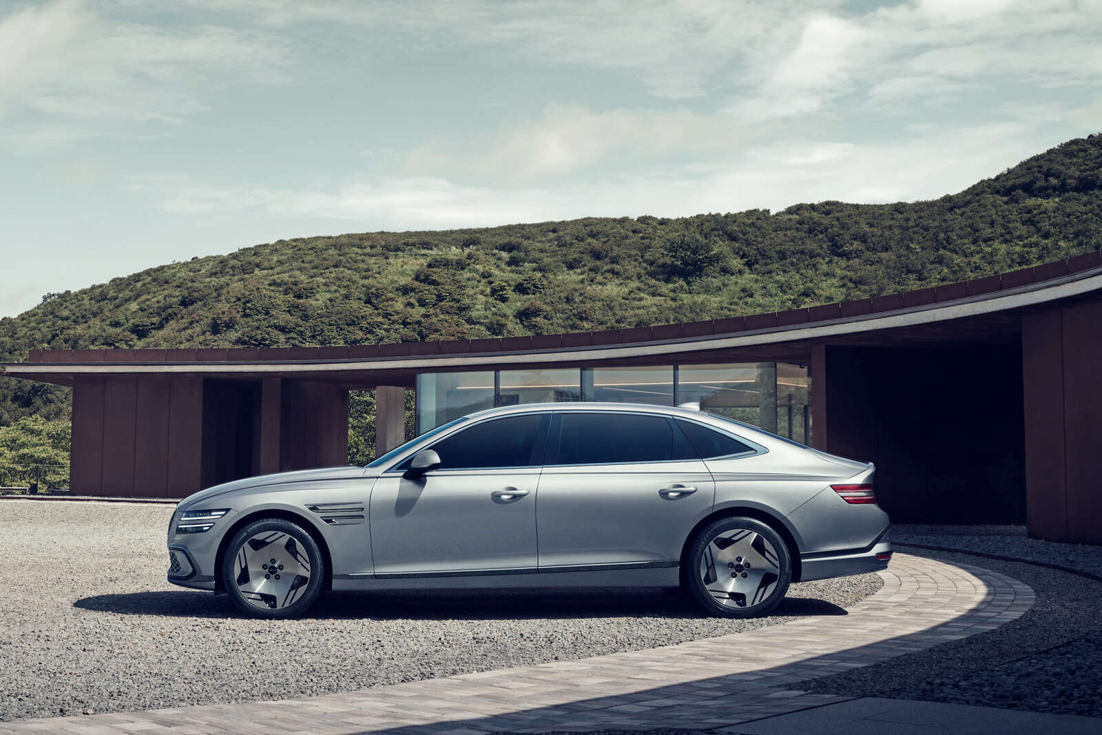 A silver 2025 Genesis Electrified G80