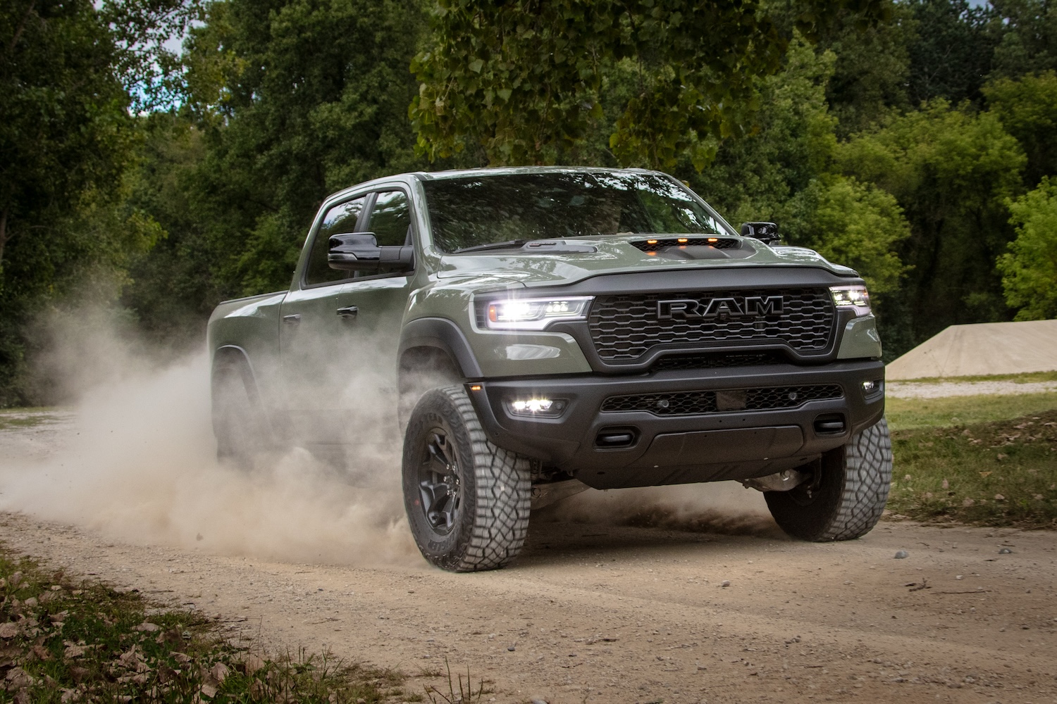 The 2026 Ram 1500 RHO on a dirt road