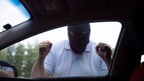 Car thief bangs on window because driver used weird hack to stop them