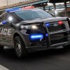 A Ford Explorer police interceptor on the road