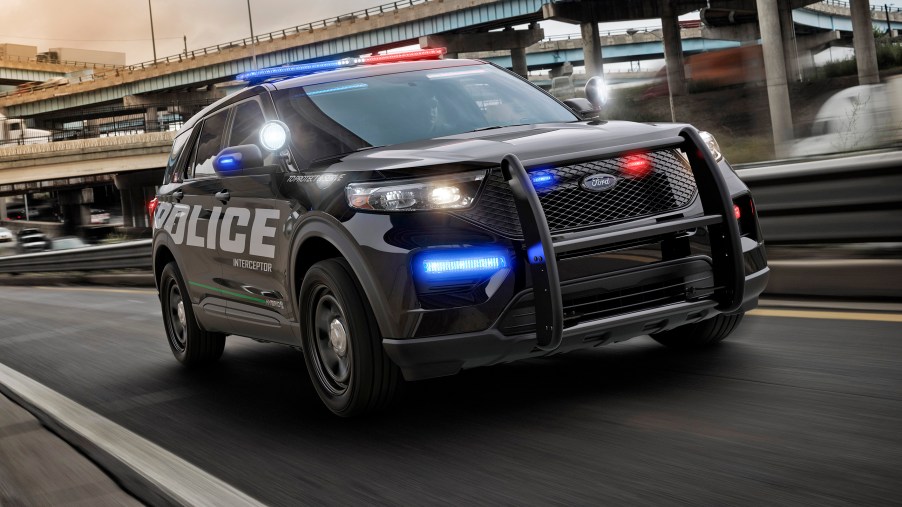 A Ford Explorer police interceptor on the road