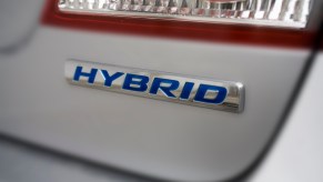 Toyota car with a Hybrid badge as all Camry and RAV4s go hybrid