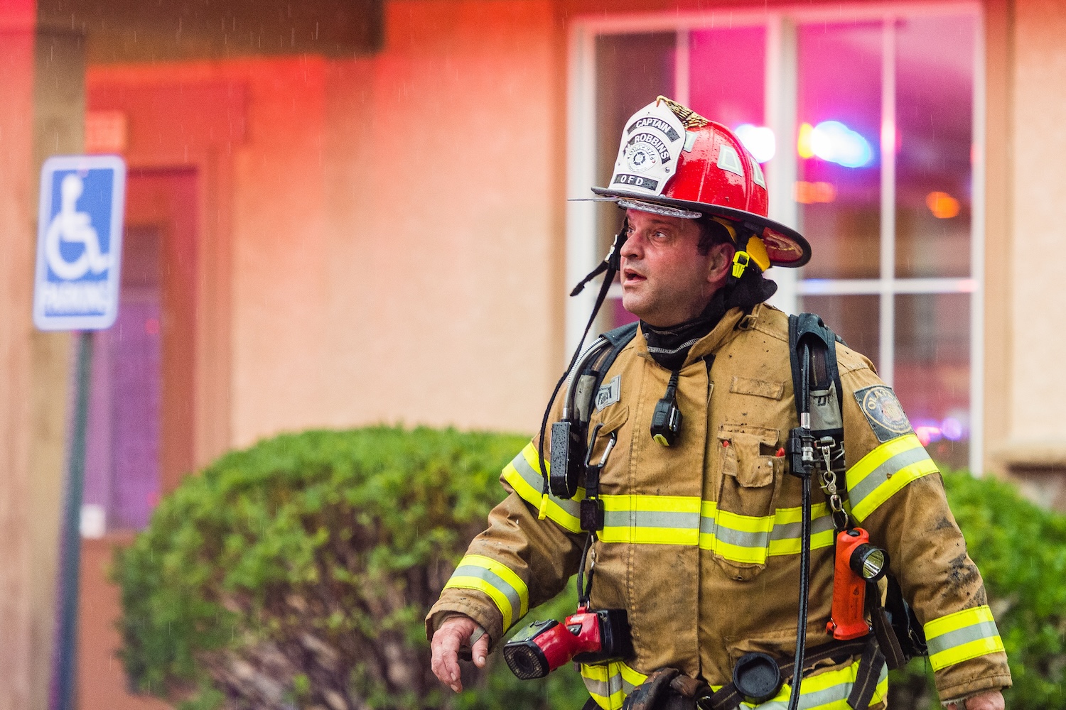 A firefighter responding to an emergency
