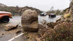 A video showed a Toyota Tundra driver nearly getting swept away by a California mudslide.