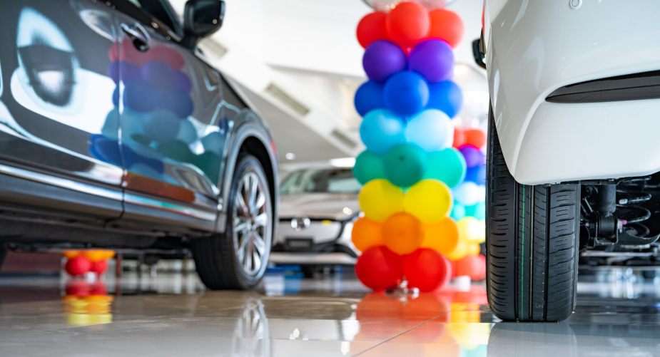 A used car dealership showroom in close low view