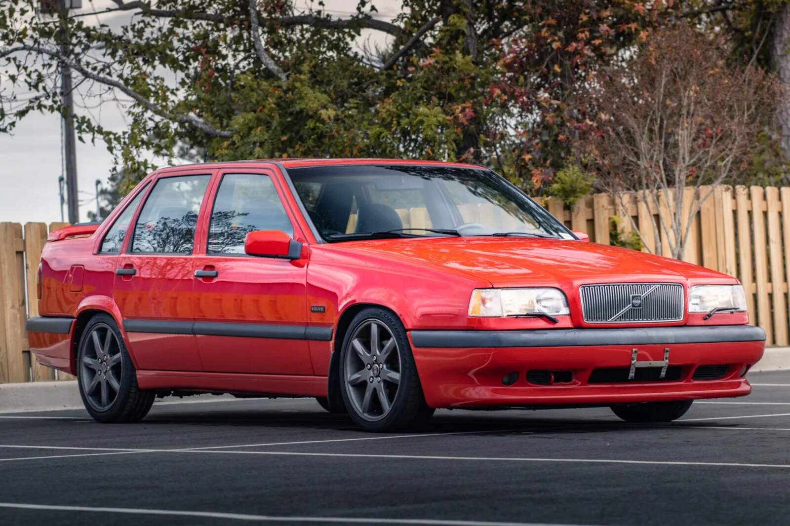  A red 1996 Volvo 850R parked in right front angle view