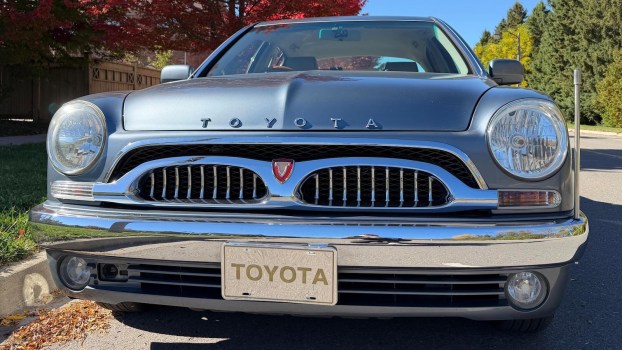 The grille of a Toyota Origin handbuilt retro luxury car.