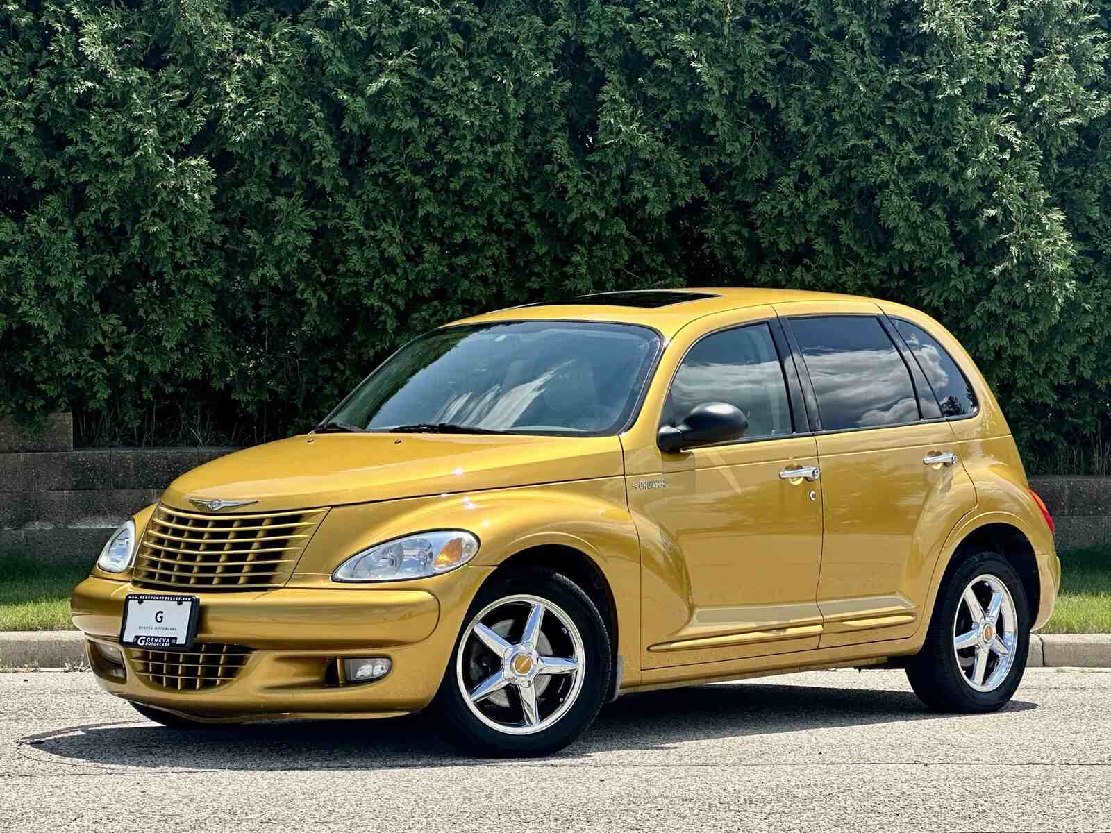 A gold 2002 Chrysler PT Cruiser parked in left front angle view