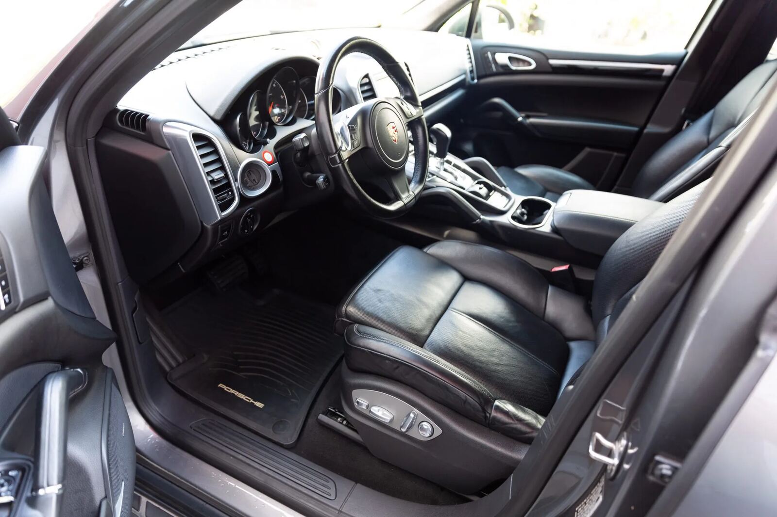 The left front interior of a 2014 Porsche Cayenne Diesel