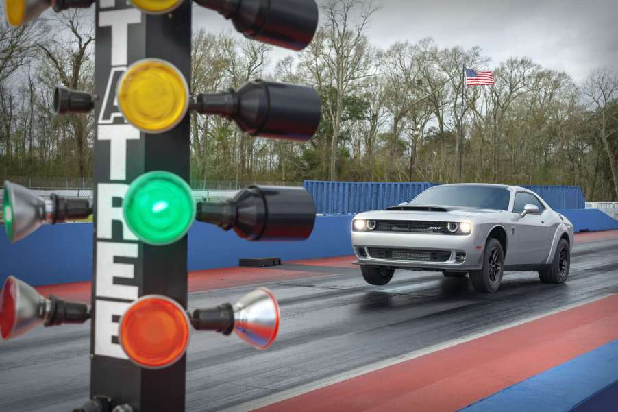 A silver 2023 Dodge Challenger SRT Demon 170 starting at a timed drag race