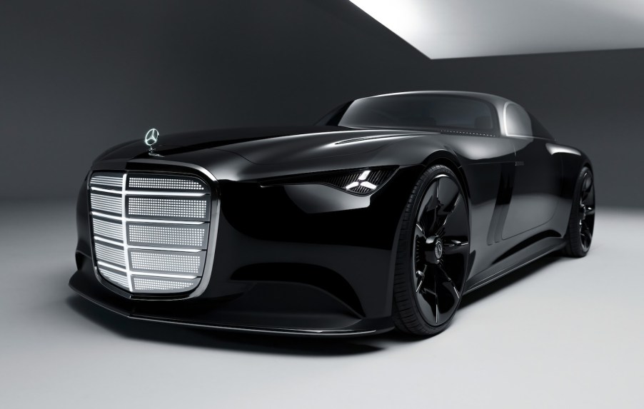 The tall grille and black paint of Merceds' Vision Iconic concept car, parked in front of a grey background.