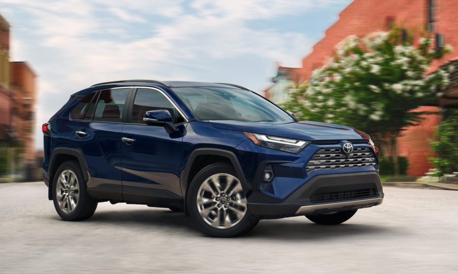 A dark blue 2025 Toyota RAV4 parked in right front angle view