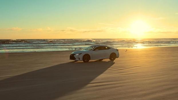 The sun sets over a Lexus RC, one of the cars that won't be around for the new year.