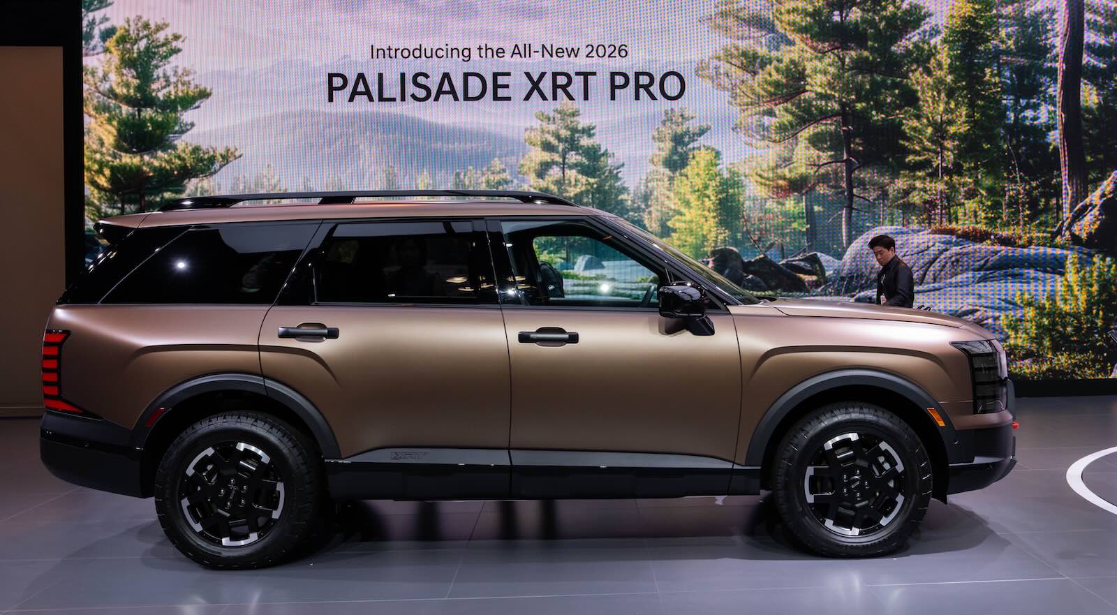 New 2026 Hyundai Palisade SUV on stage at an auto show.