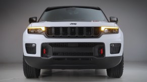Black grille on a white Jeep Grand Cherokee SUV
