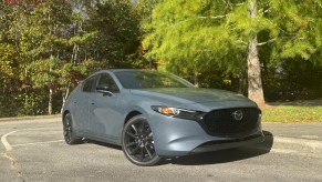 The 2026 Mazda3 Hatch near trees