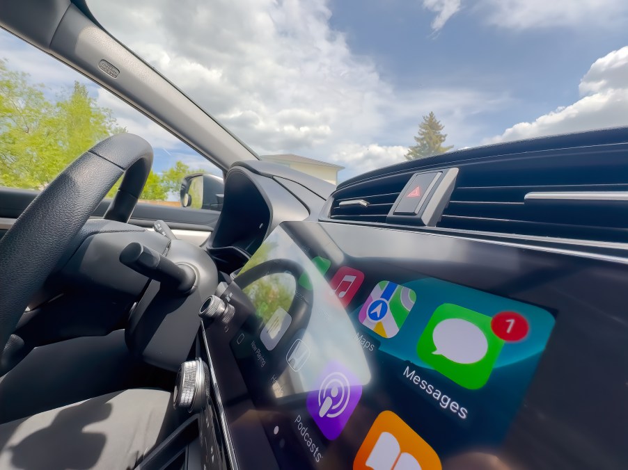 A car infotainment screen with Apple CarPlay