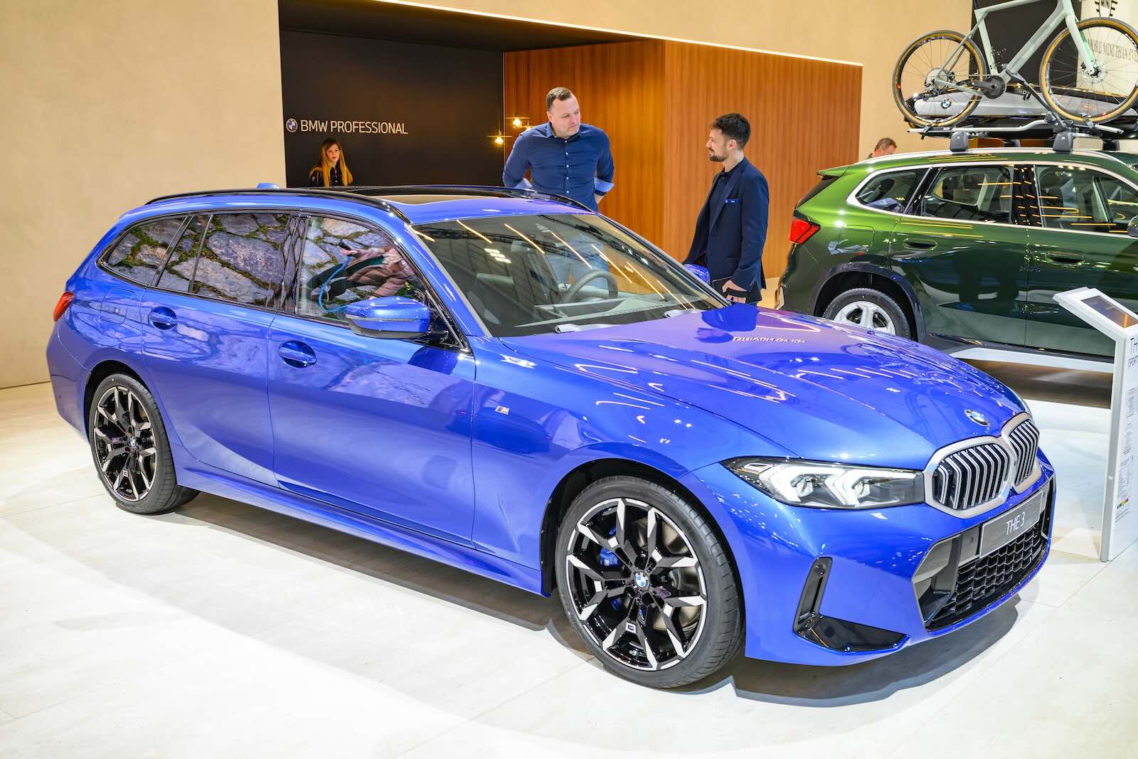 Blue BMW 3 Series station wagon a ta car show