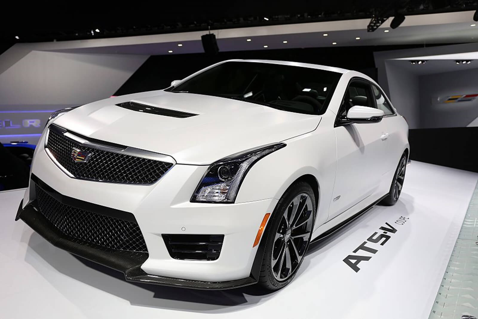 A Cadillac ATS-V, one of the luxury cars with an attractive used car price tag, on display. 