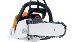 Orange and white chainsaw on a white background.