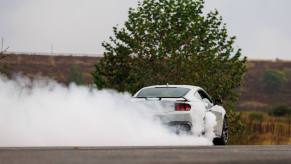 The new 2026 Ford Mustang RTR in a cloud of smoke.