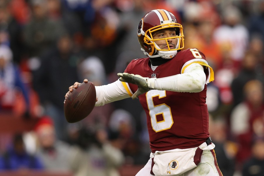 Mark Sanchez playing football