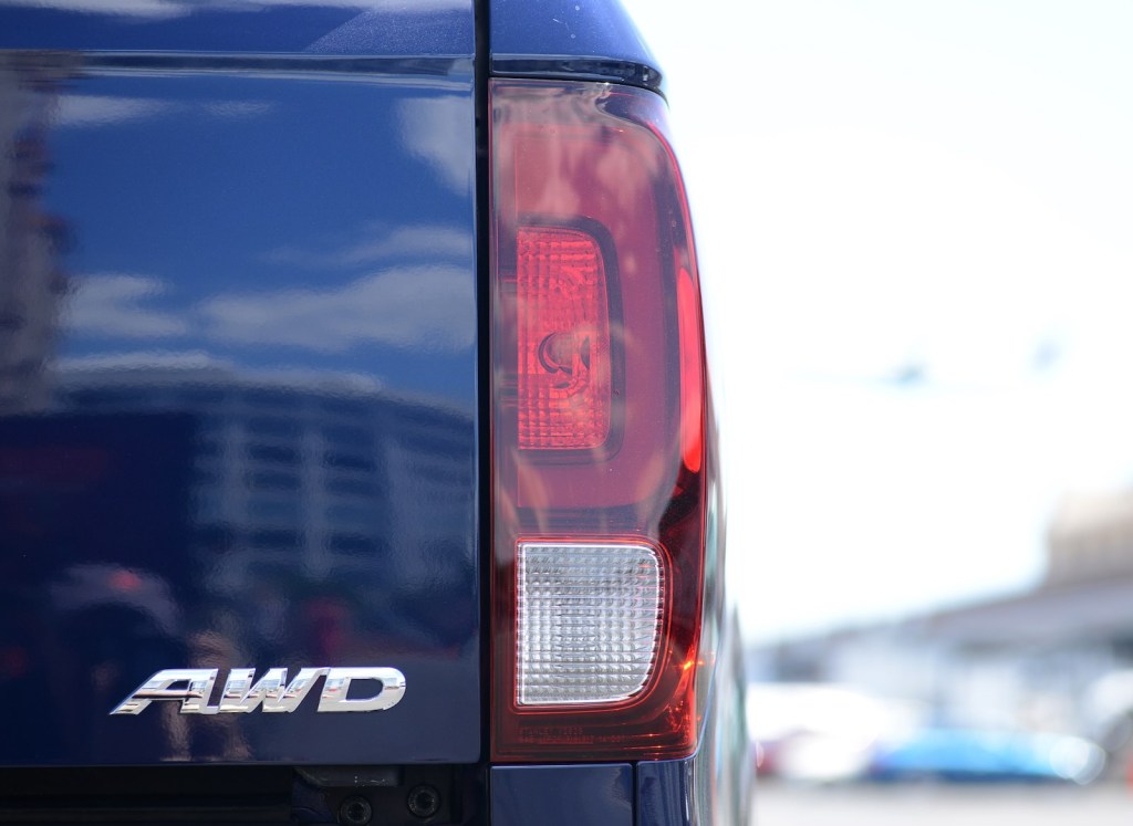The AWD badge on the rear of a Honda Ridgeline pickup truck
