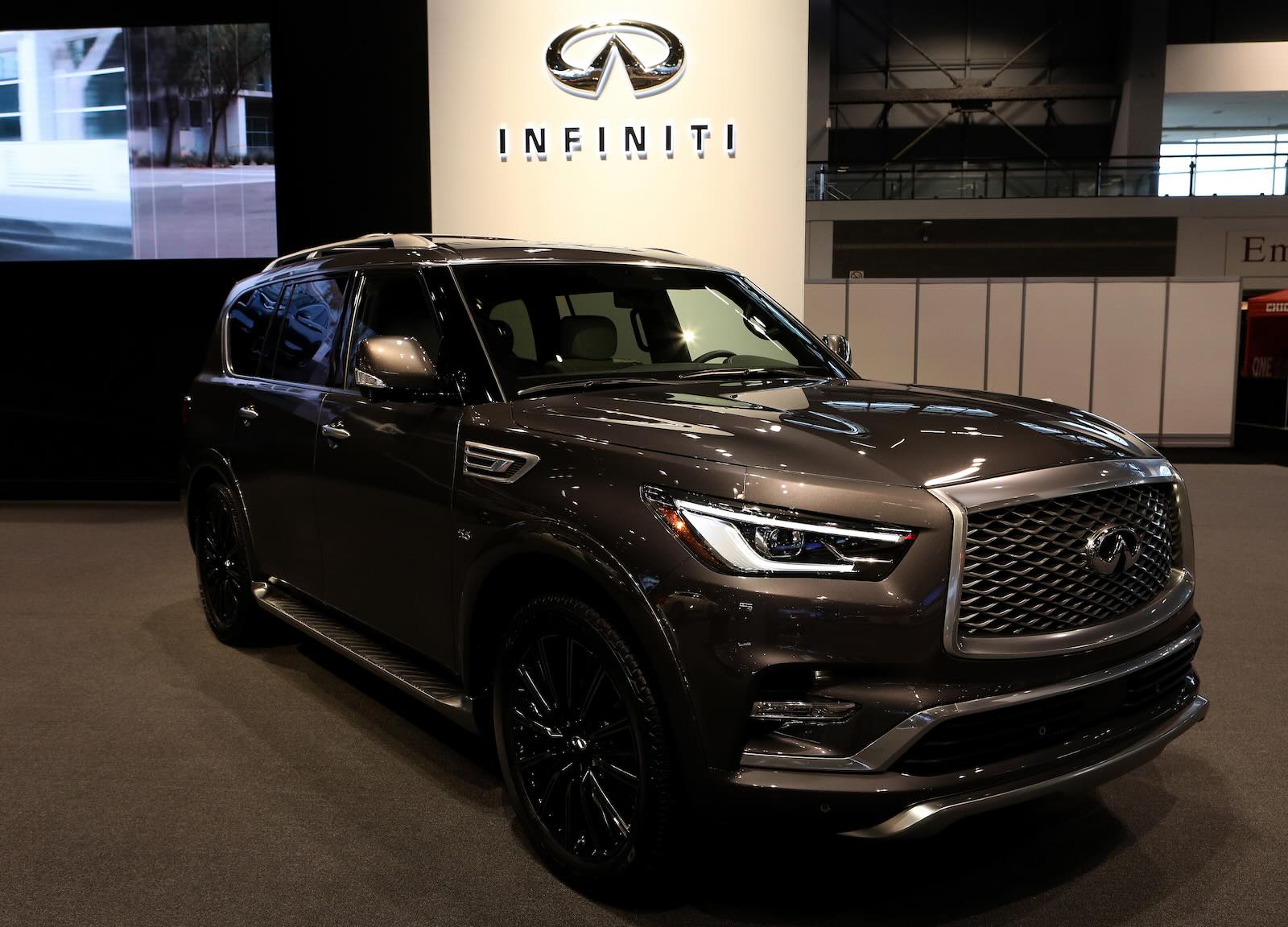 Infiniti's luxury QX80 SUV on stage at an auto show