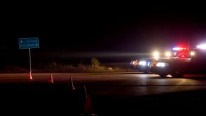 A pair of Las Vegas police cars at a DUI stop.