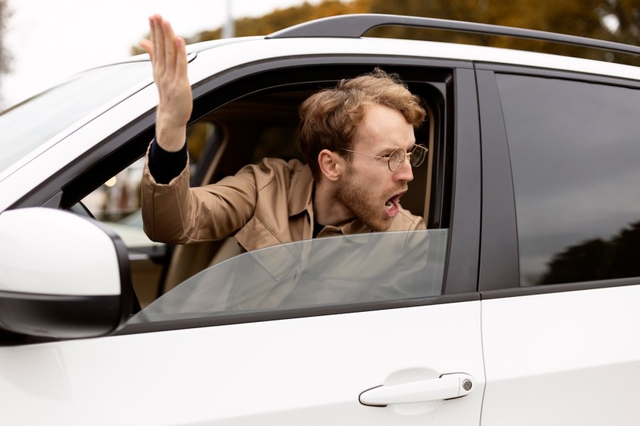 Massachusetts man yells form his Subaru during a road rage incident.