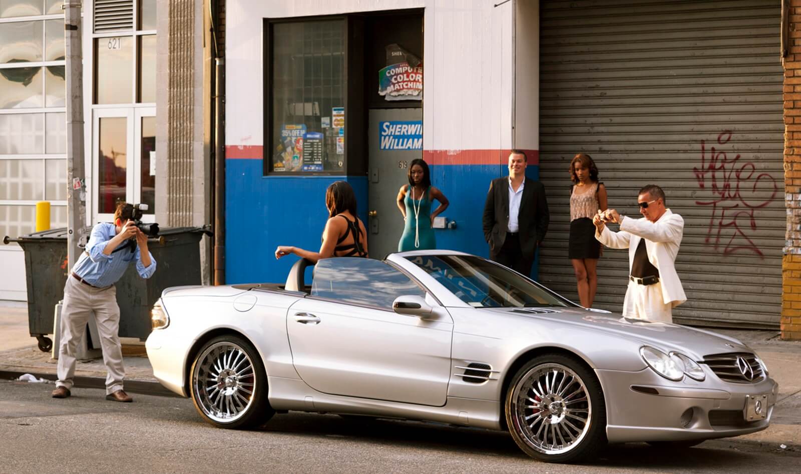 A photoshoot with an R230 Mercedes-Benz SL luxury sports car.