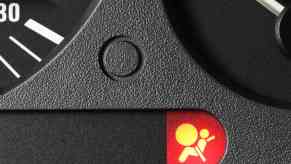 Airbag warning light on a Mitsubishi dashboard