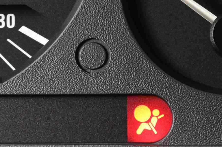 Airbag warning light on a Mitsubishi dashboard
