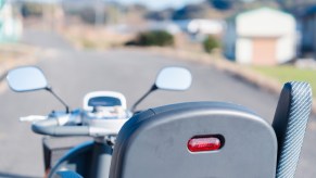 Motorized shopping cart Florida woman stole from Publix, the open road in the distance.