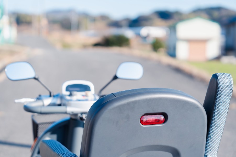 Motorized shopping cart Florida woman stole from Publix, the open road in the distance.