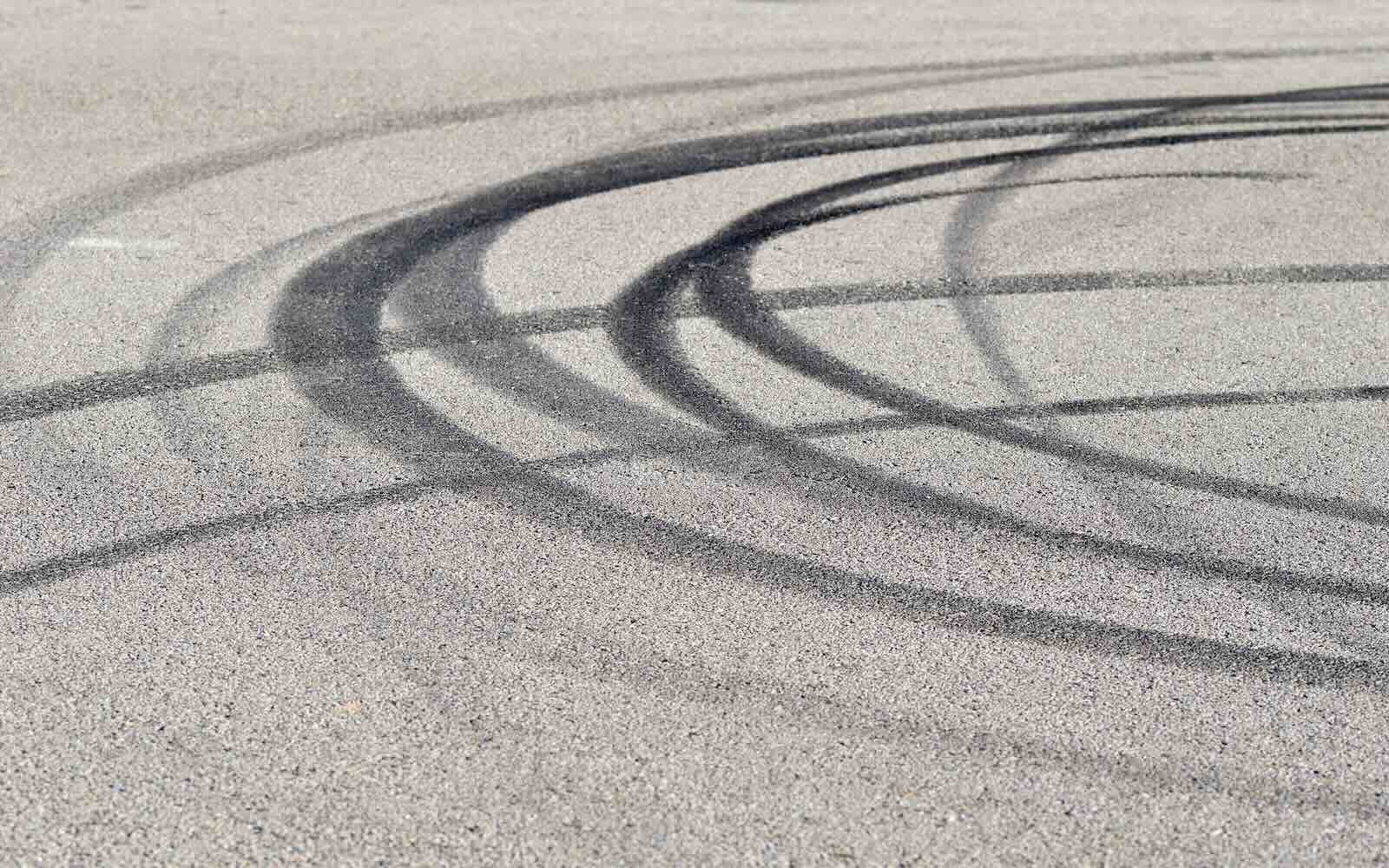 Skid marks left by the Lucid Air Sapphire high performance sedan.