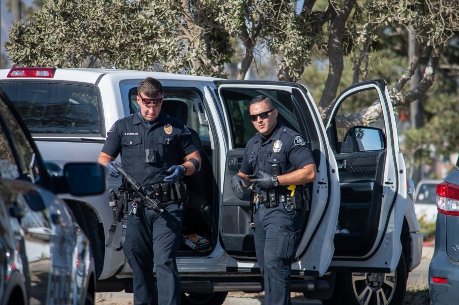 Police searching a truck